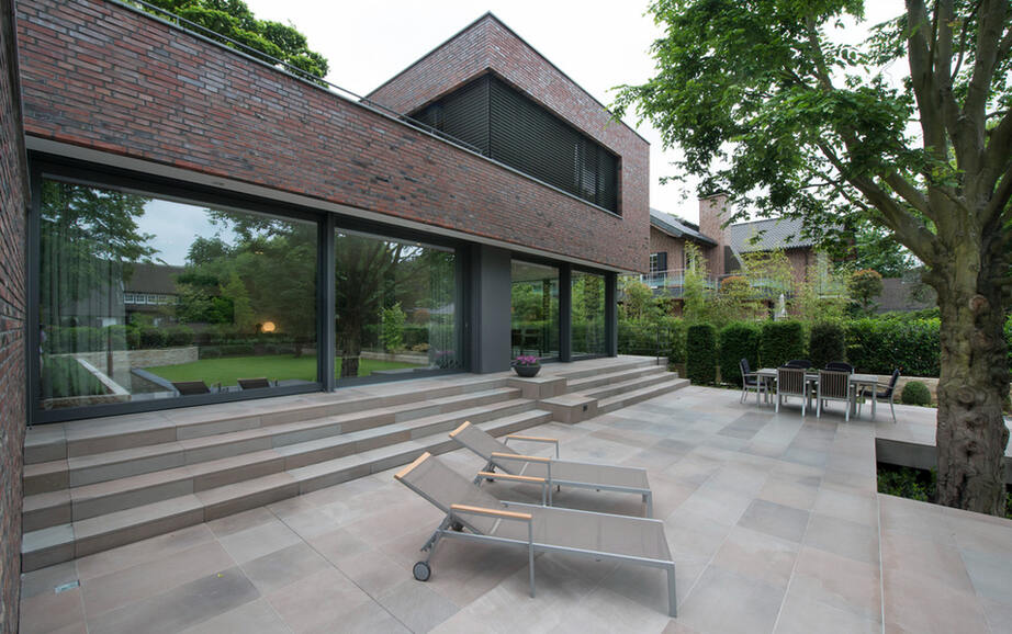 Architectural highlight with generous natural stone flooring